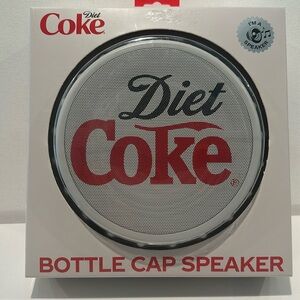 NIB Diet Coke Bottle Cap Bluetooth Speaker with LED lights.